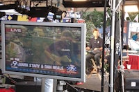 a tv screen with a man on it